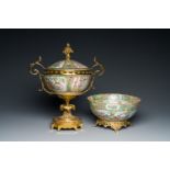 A Chinese Canton famille rose bowl and cover with fine gilt mounts and a bowl mounted on a gilt foot