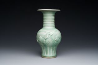 A Chinese Longquan celadon 'peony scroll' vase, Yuan
