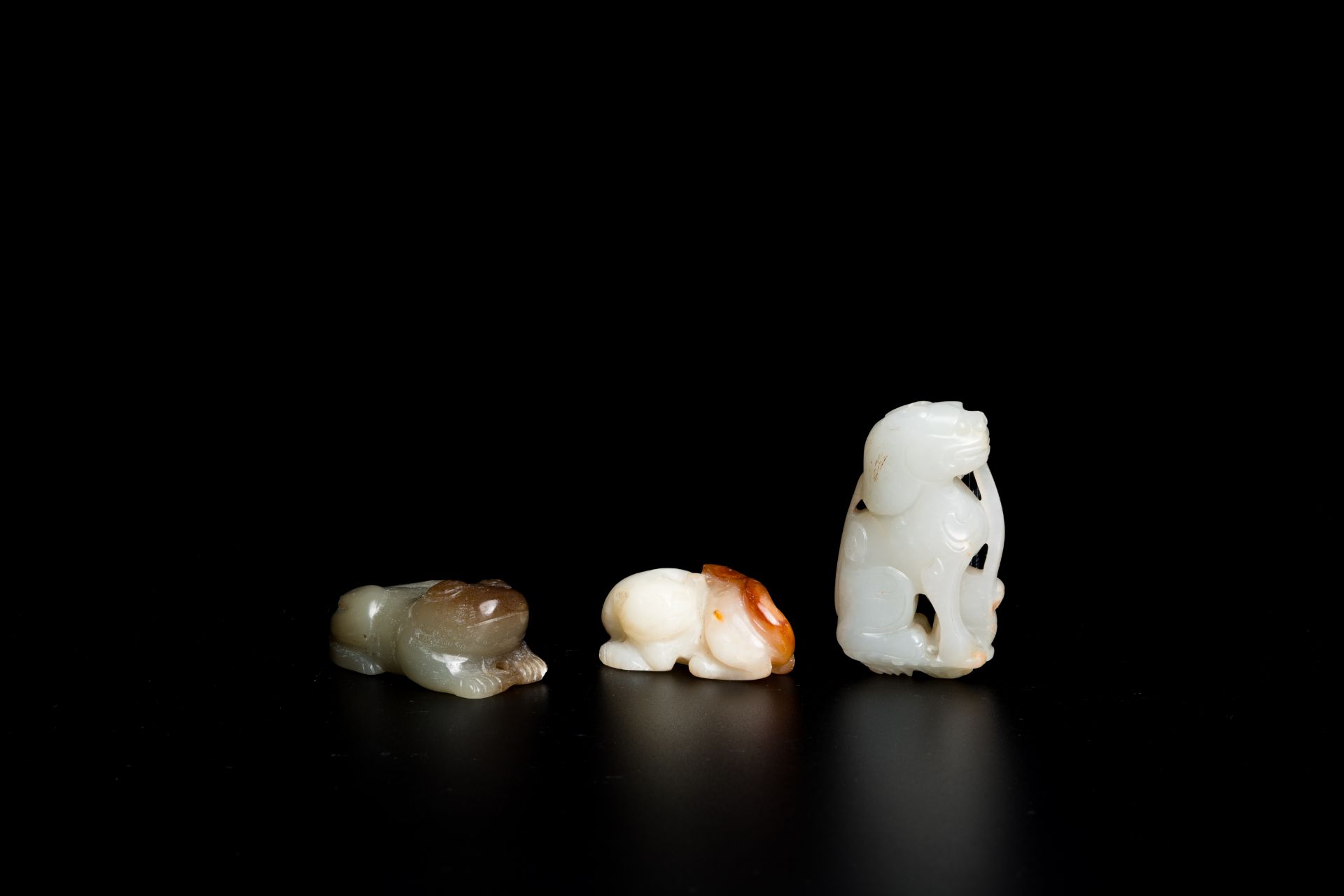 Three Chinese white and celadon jade carvings of animals, Qing/Republic