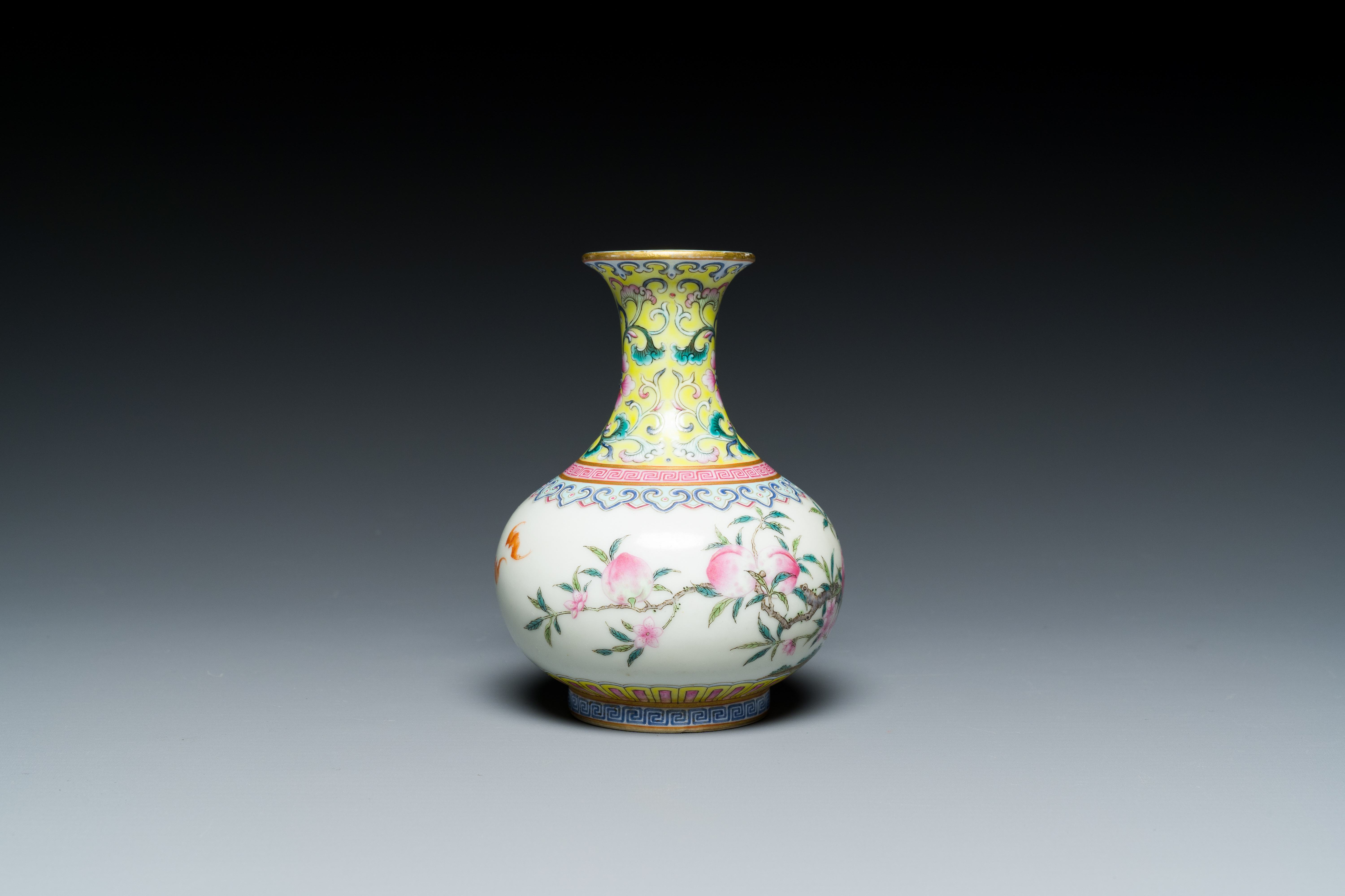 A small Chinese famille rose 'nine peaches' bottle vase, Jiaqing mark, 20th C. - Image 3 of 7