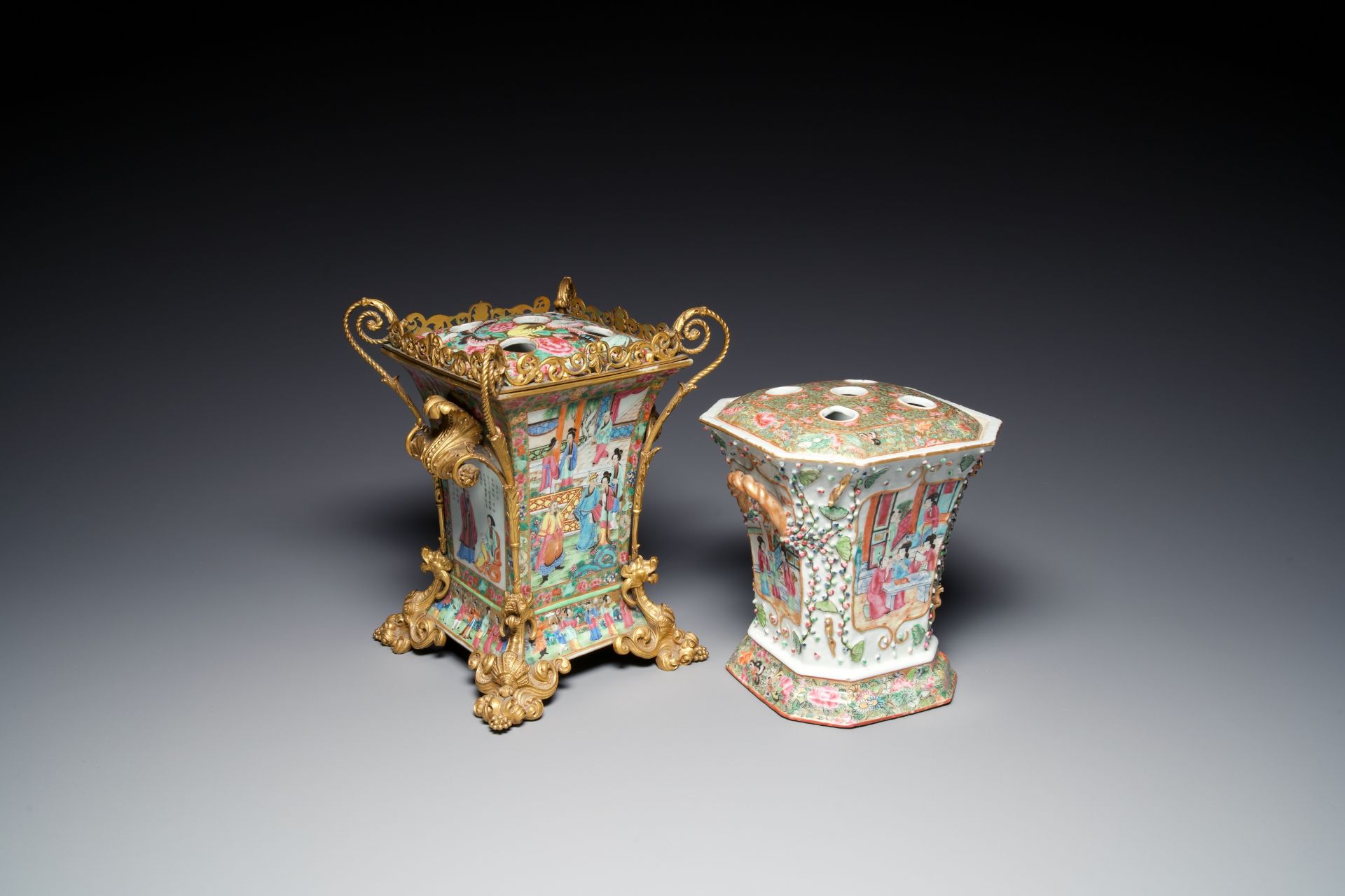 Two fine Chinese Canton famille rose flower holders, one with a gilt bronze mount, 19th C.