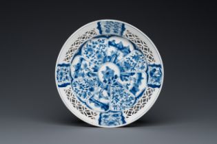 A Chinese blue and white plate with pierced rim, Kangxi