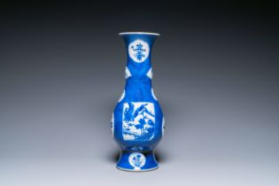 A Chinese powder-blue-ground bottle vase with landscape panels, Kangxi