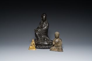 Three Chinese bronze sculptures of Buddha and of Guanyin, Ming and later