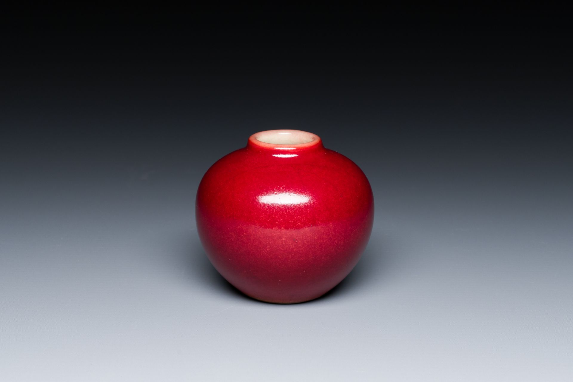 A small Chinese red-glazed globular vase, Qing