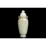 A Chinese celadon jade vase and cover, Qing