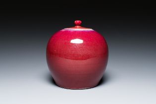 A Chinese flambe-glazed jar and cover, 19th C.