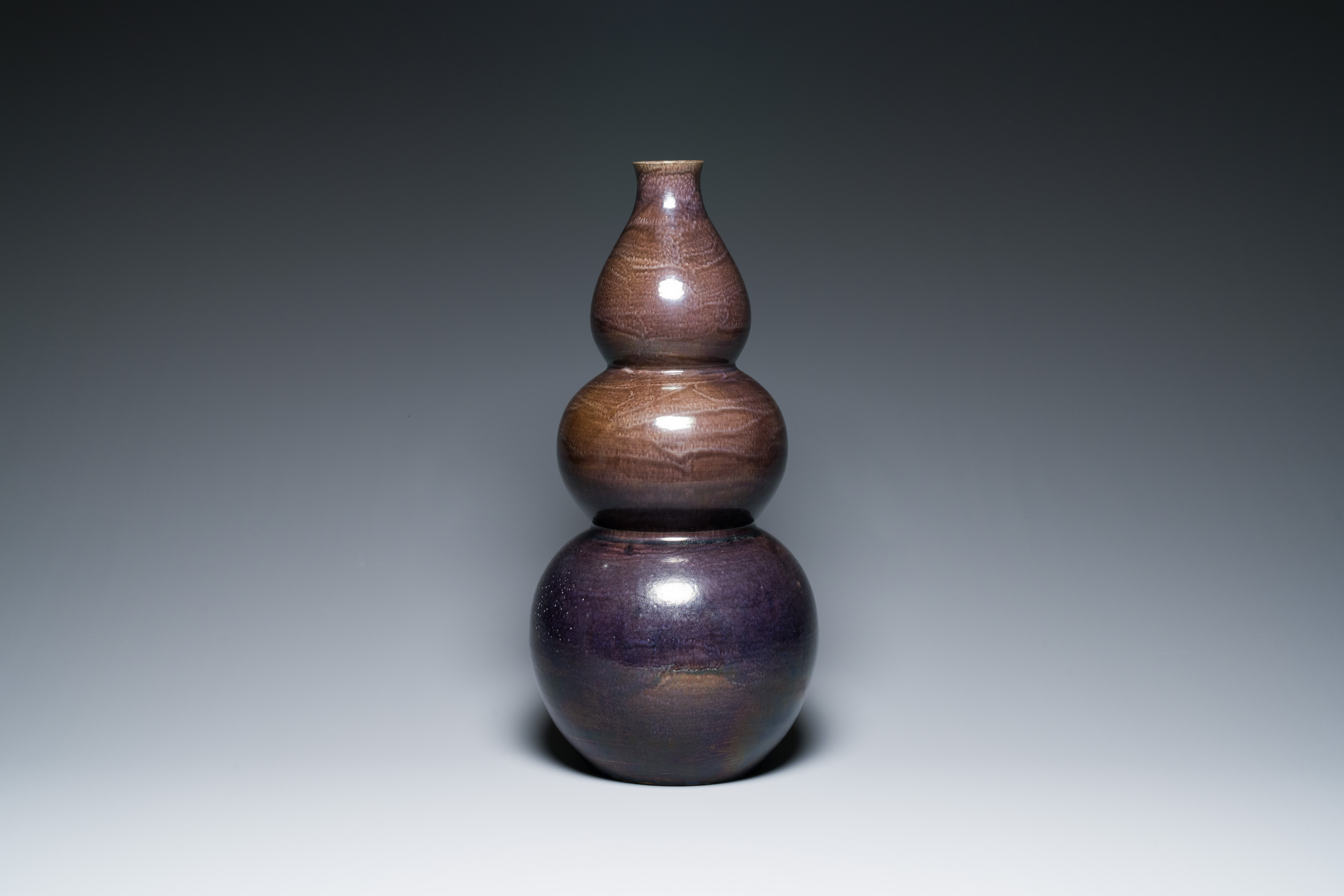 A large Chinese aubergine-glazed triple gourd vase, 18th C. - Image 4 of 6