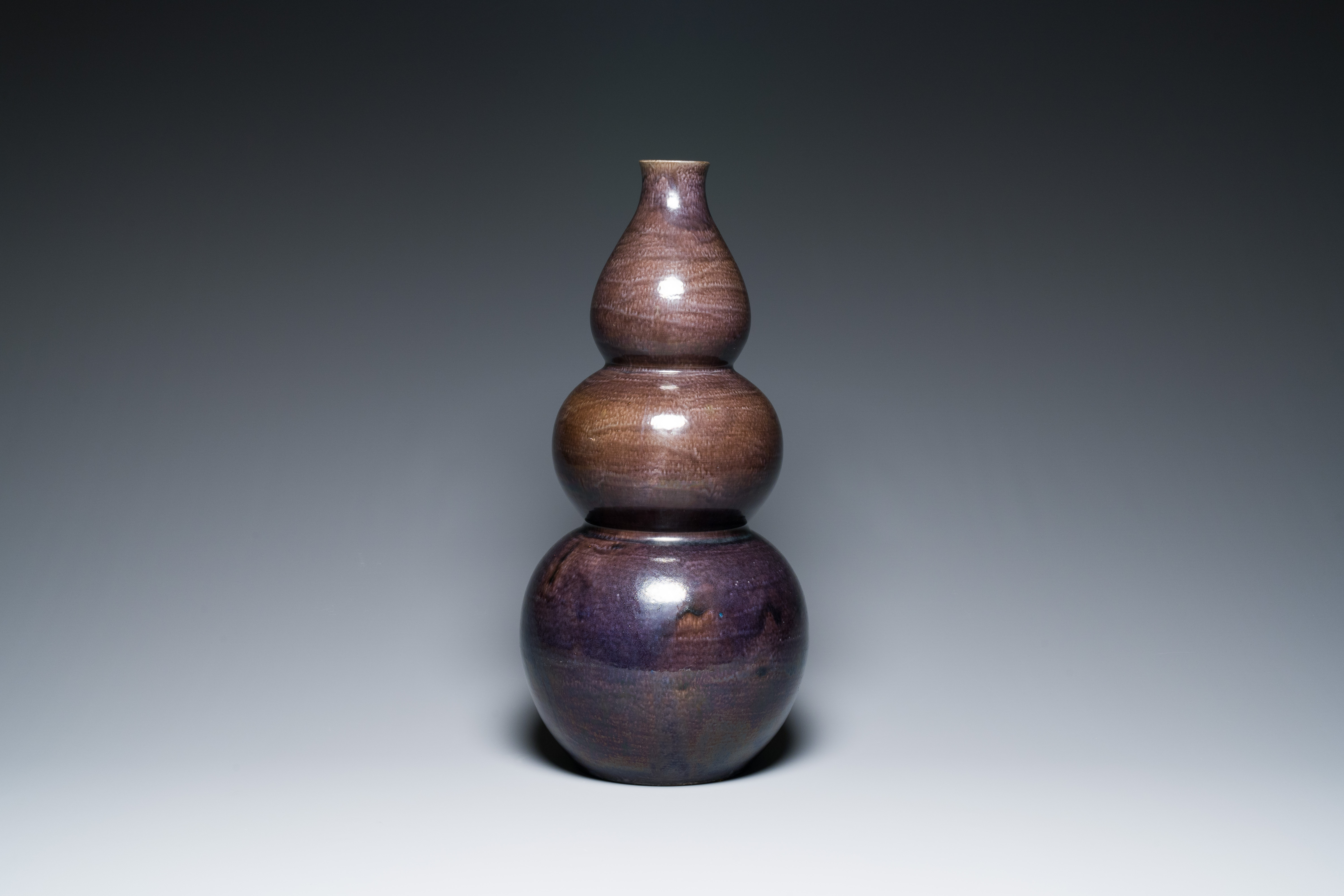 A large Chinese aubergine-glazed triple gourd vase, 18th C. - Image 2 of 6