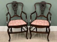 ANTIQUE MAHOGANY PARLOUR ARMCHAIRS - a pair, with carved backs, upholstered seat pads, on cabriole
