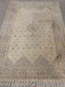 WASHED WOOLLEN RUG - neutral ground, multiple pattern borders and with central zig zag and hexagonal
