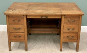 VINTAGE OAK WORK DESK - with metamorphic central lift panel flanked by twin banks of three opening