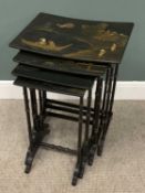 CIRCA 1920 TABLE QUARTETTO - set of four ebonized, lacquered and chinoiserie decorated occasional