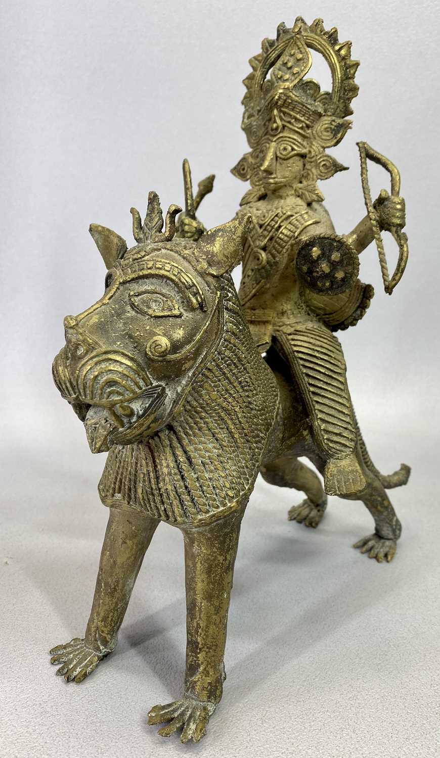 BRONZED METALWARE MODEL OF THE HINDU GODDESS 'KALI' RIDING A LION, 26.5cms H, wood and brass Ankush, - Bild 4 aus 4