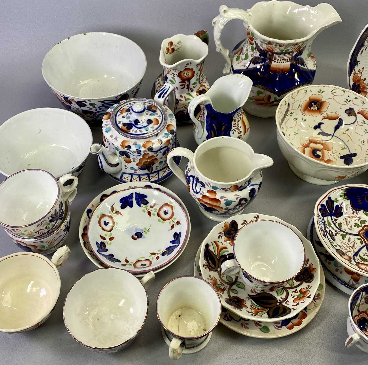 GAUDY WELSH LATE 19TH CENTURY POTTERY - a large selection including a pair of panelled jugs, 18.5cms - Image 2 of 4