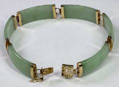 CONTINENTAL 9CT GOLD SIX SECTION JADE BRACELET - 19cms overall L open, Import Duty marks stamped '