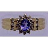 14CT GOLD AMETHYST & DIAMOND CLUSTER RING - the central amethyst surrounded by 12 tiny diamonds, the