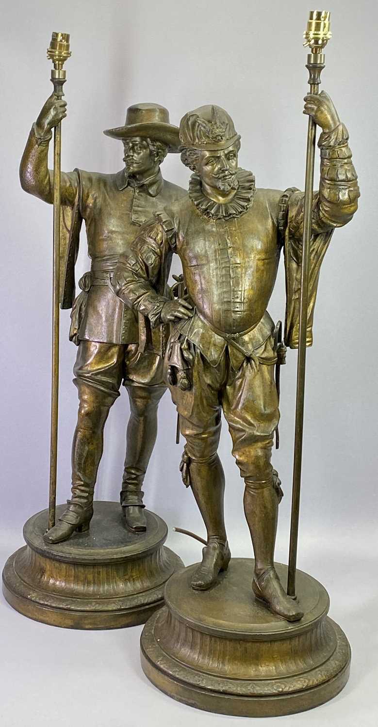 FRENCH SPELTER FIGURAL LAMPS, A PAIR - Late 19th Century modelled as French Cavaliers standing on