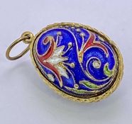 UNMARKED YELLOW METAL & ENAMEL EGG SHAPED PENDANT FOB - 20mm L, 7grms (J6)