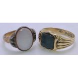 9CT GOLD HARDSTONE SET SIGNET RINGS (2) - one hallmarked Chester 1900 with shield shape hardstone