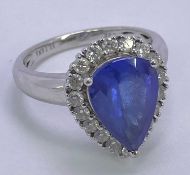 18CT WHITE GOLD PEAR CUT TANZANITE & DIAMOND RING - facet cut central stone in excess of 2cts, 9 x