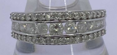 9CT WHITE GOLD 3 ROW DIAMOND HALF ETERNITY RING - graduated central row of 11 stones, 0.10ct and