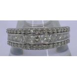 9CT WHITE GOLD 3 ROW DIAMOND HALF ETERNITY RING - graduated central row of 11 stones, 0.10ct and