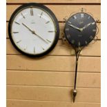 WALL CLOCKS (2) - a Schatz Elexacta swinging wall clock, 54cms inc adjustable pendulum and a