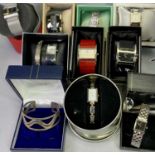 LADY'S DESIGNER WRISTWATCHES (9) - all in presentation boxes and a 925 silver bangle in an Elizabeth