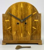 AN ART DECO WALNUT CASED DOME TOP MANTEL CLOCK - with inlaid hour markers, eight day movement