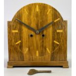 AN ART DECO WALNUT CASED DOME TOP MANTEL CLOCK - with inlaid hour markers, eight day movement