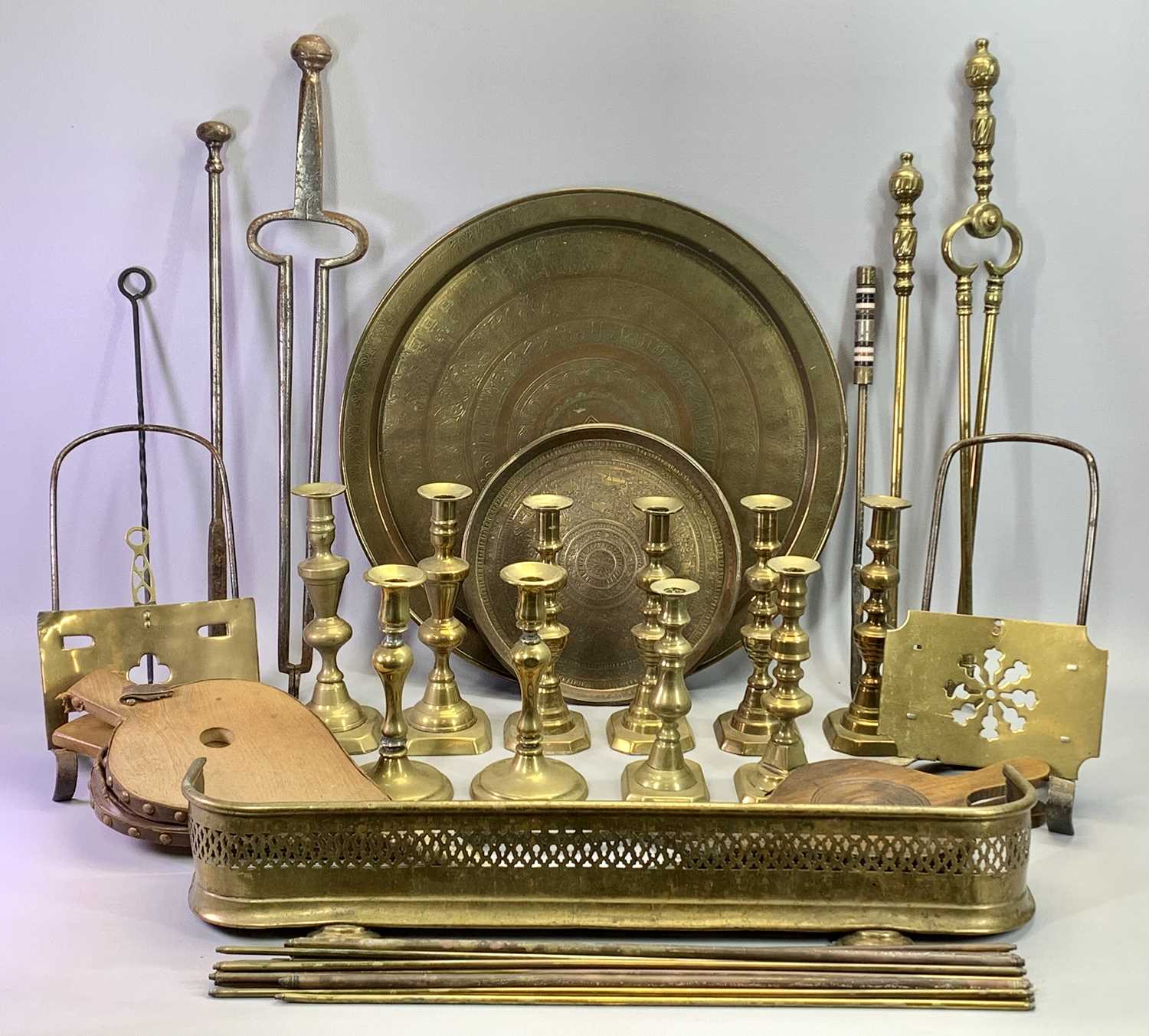 VICTORIAN BRASSWARE - five pairs of candlesticks, 25.5cms H, two pierced brass and steel fireside