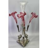 A 19TH CENTURY EPERGNE - shaped triangular base standing on bun feet and having three griffin form