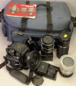 A MAMIYA M645 1000S SLR CAMERA - fitted with 80mm lens and Deluxe L grip holder with accessories