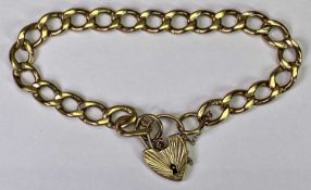 9CT GOLD FLAT CURB LINK BRACELET - with padlock clasp, the padlock and three or four links