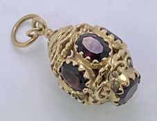 VICTORIAN STYLE 9CT GOLD OPENWORK PENDANT FOB - fashioned lantern style and set with facet cut