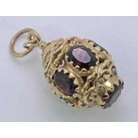 VICTORIAN STYLE 9CT GOLD OPENWORK PENDANT FOB - fashioned lantern style and set with facet cut