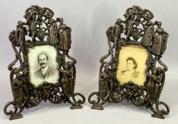 BEATRICE BAROQUE STYLE COPPERED CAST METAL EASEL TYPE PHOTOGRAPH FRAMES, A PAIR - decorated in