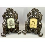BEATRICE BAROQUE STYLE COPPERED CAST METAL EASEL TYPE PHOTOGRAPH FRAMES, A PAIR - decorated in