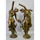 FRENCH ART NOUVEAU PAINTED SPELTER FIGURES, A PAIR - dancing flower girls, 60cms H