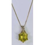 9CT GOLD PENDANT NECKLACE - the open pendant set with a large, believed, yellow facet cut citrine