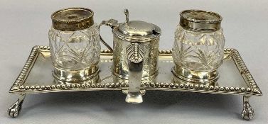 GEORGE III TWO BOTTLE INK STAND and a single mustard pot with thumb lift lid, London 1773, Maker
