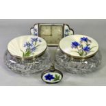 CIRCULAR CUT GLASS DRESSING TABLE JARS, A PAIR - with silver and cream guilloche enamel lids, with