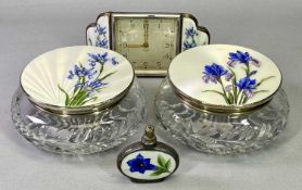 CIRCULAR CUT GLASS DRESSING TABLE JARS, A PAIR - with silver and cream guilloche enamel lids, with