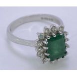 18CT WHITE GOLD EMERALD & DIAMOND RING - baguette cut emerald, slightly over 1.5cts, surrounded by