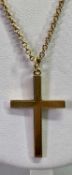 9CT GOLD CROSS ON A CURB LINK NECKLACE - stamped '9-375' and '9ct' respectively, 27.5cms overall