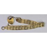 9CT GOLD GATELINK BRACELET - with padlock clasp and safety chain, 15.3grms (J72)