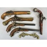 REPRODUCTION FLINTLOCK PISTOLS, A PAIR with 25cms metal barrels, the lock plates stamped 'Paris',