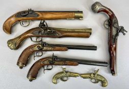 REPRODUCTION FLINTLOCK PISTOLS, A PAIR with 25cms metal barrels, the lock plates stamped 'Paris',