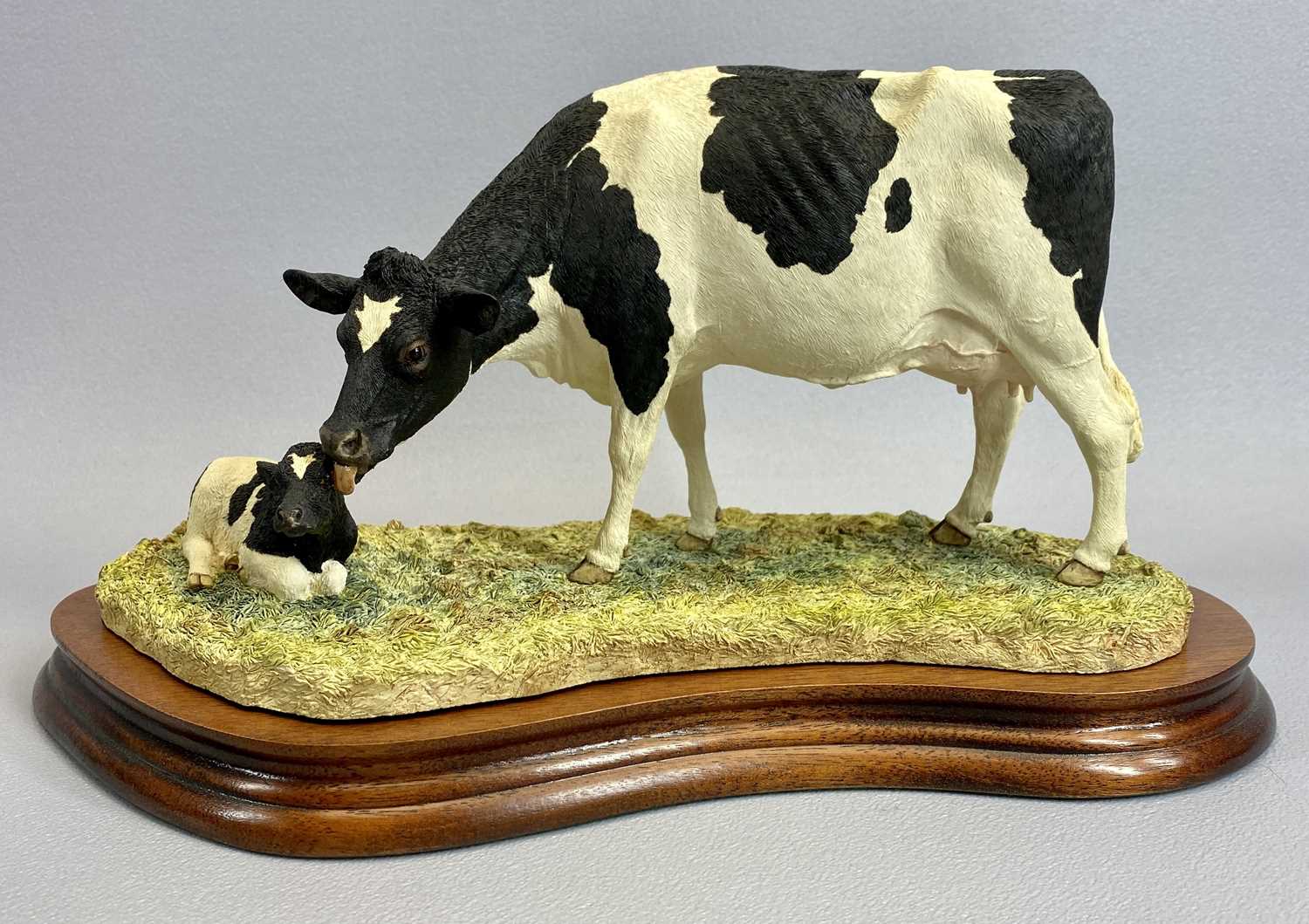 BORDER FINE ARTS FIGURE - Holstein Friesian cow and calf, B0309, 17cms H, boxed